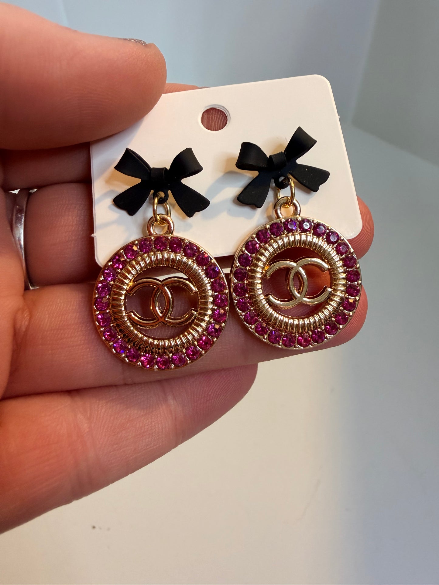 CC bow earrings