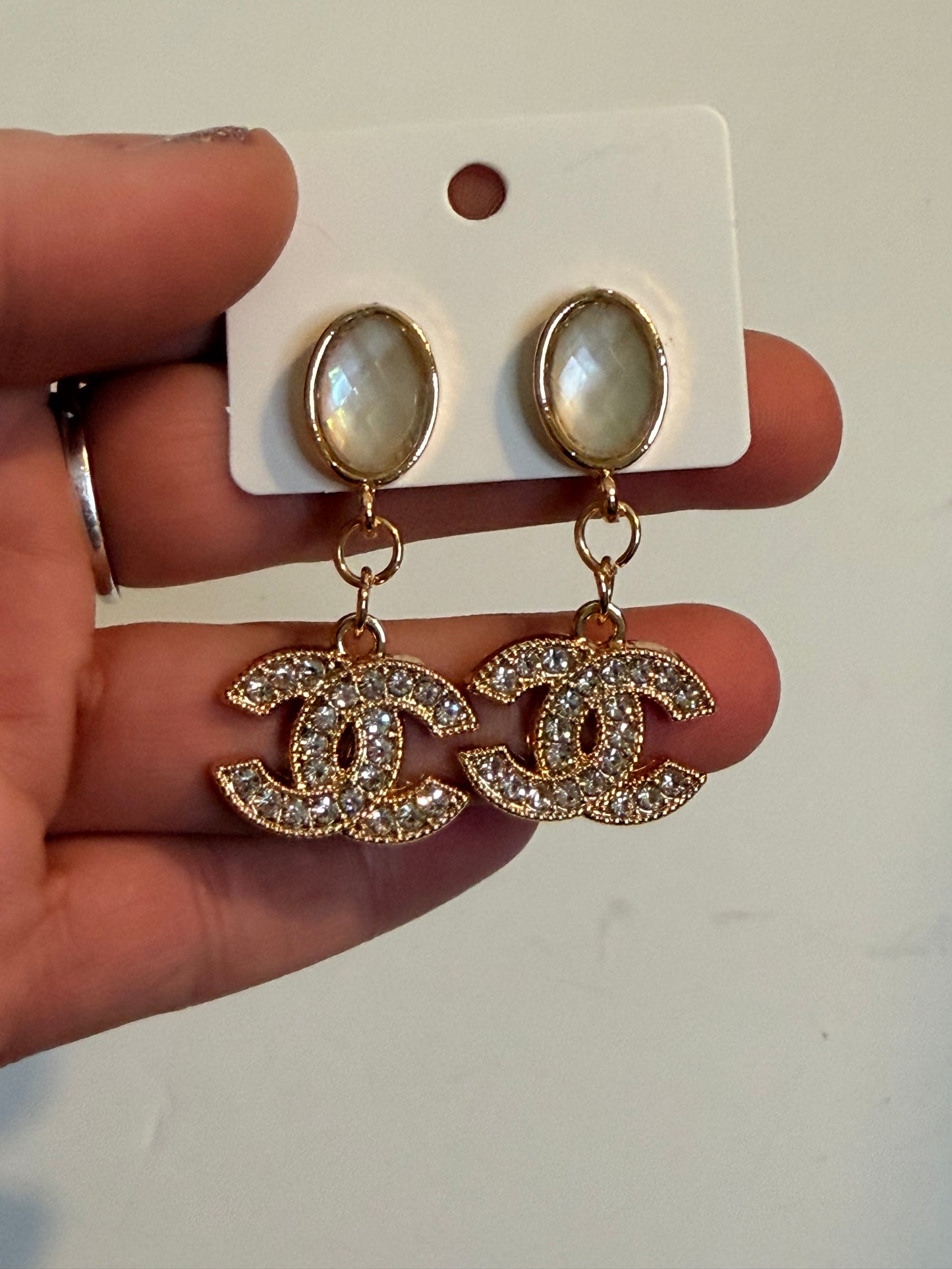 CC dangle earrings