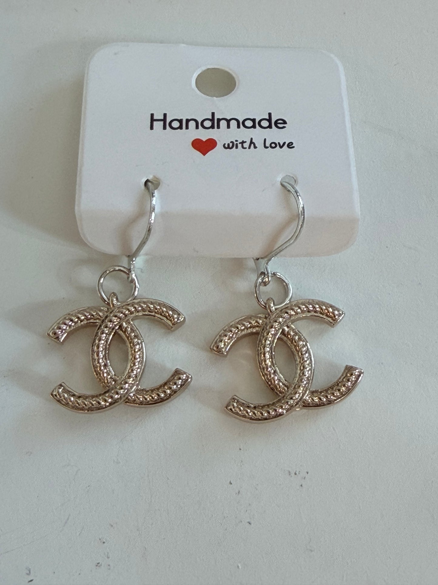 Antique silver CC earrings