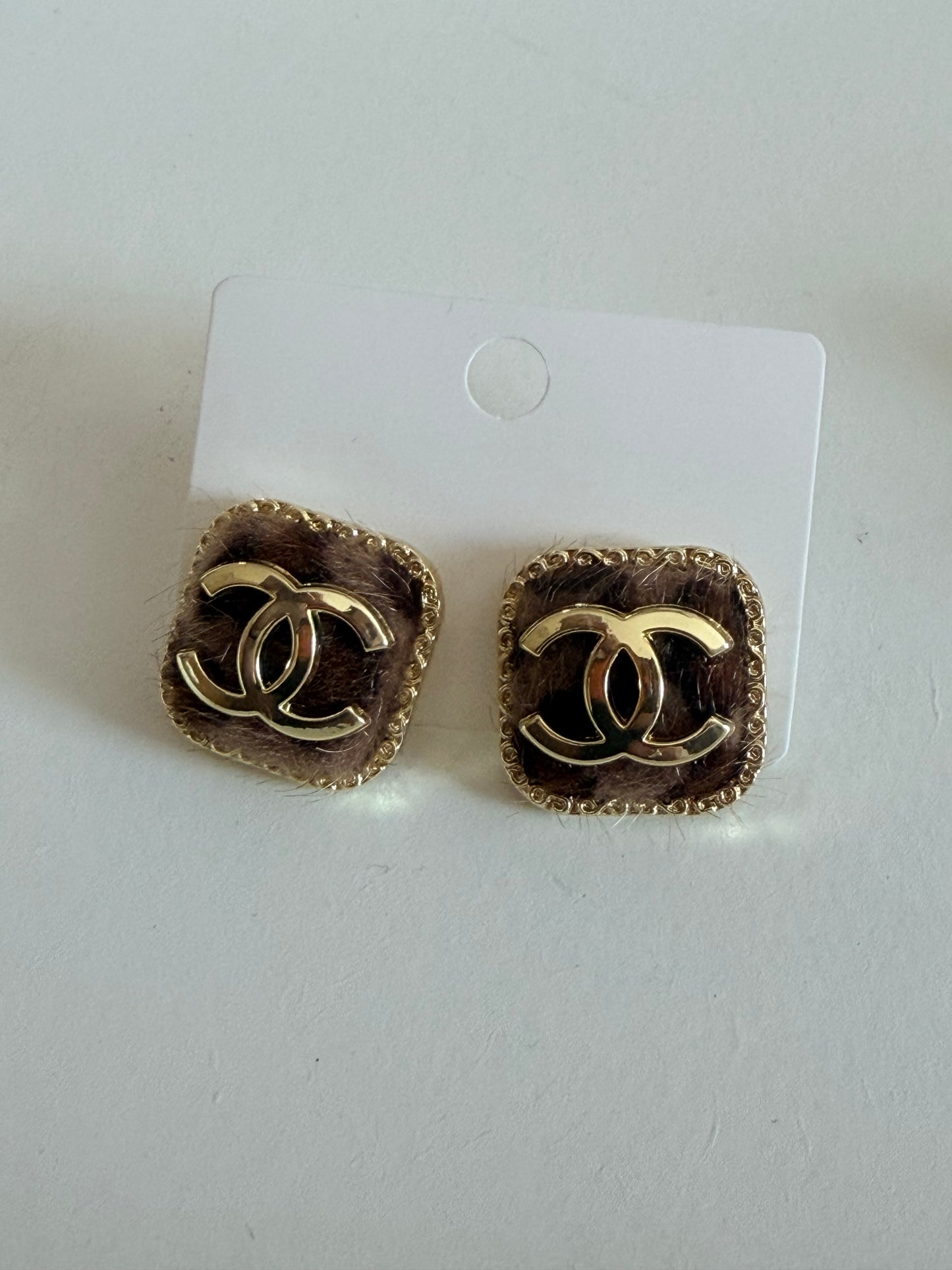 CC animal print earrings