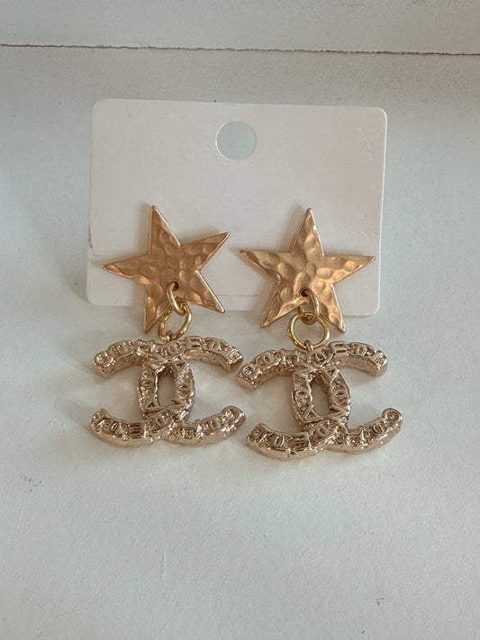 CC star earrings