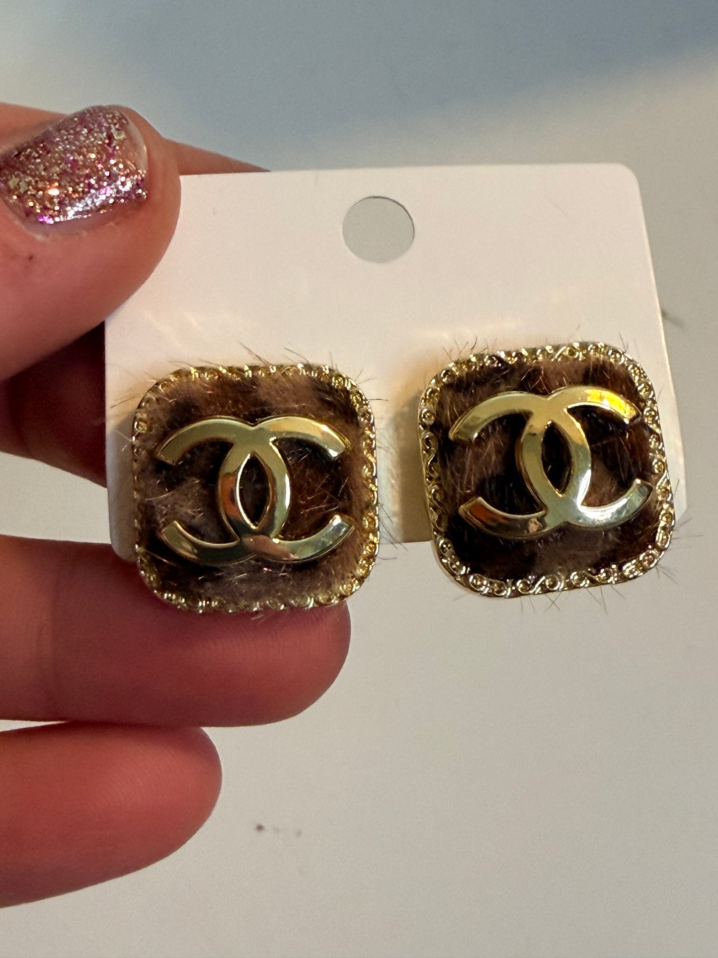 CC animal print earrings