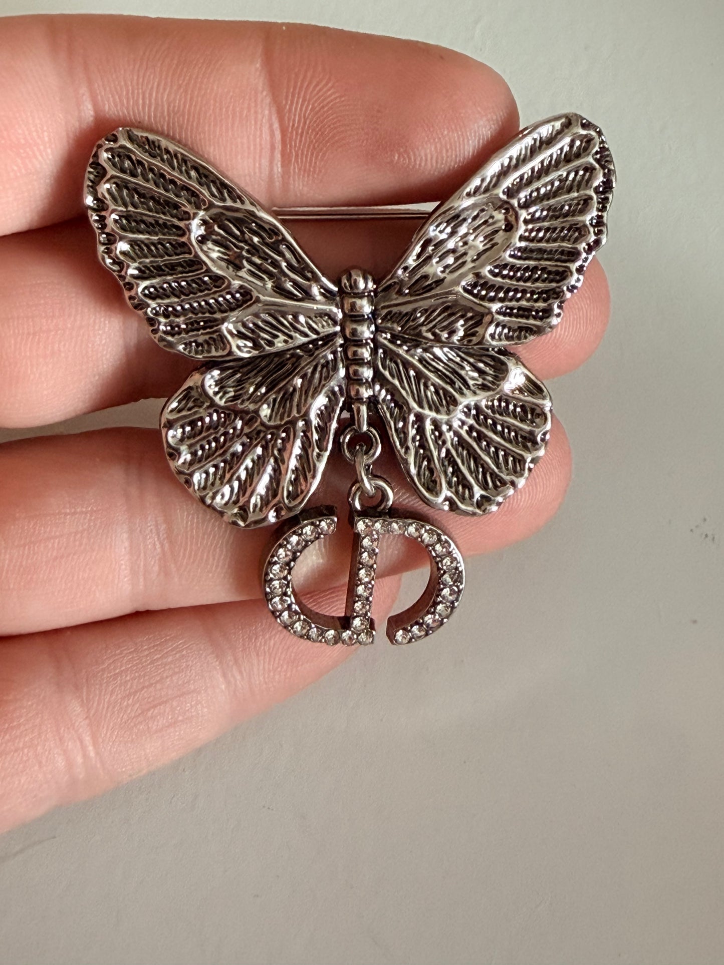 CD butterfly brooch