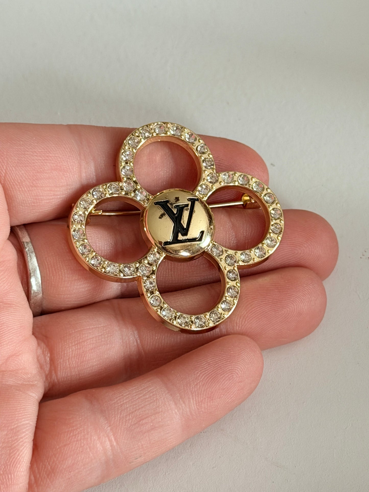 LV clover brooch