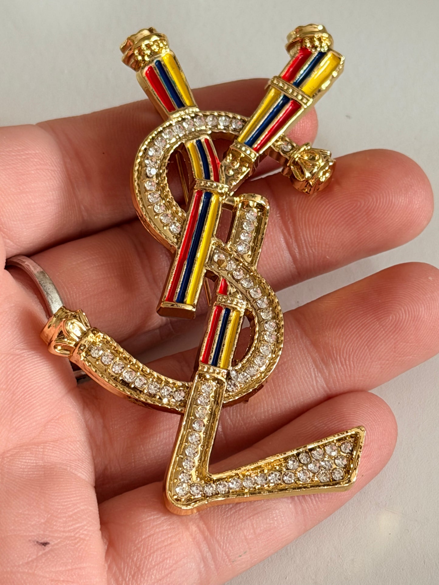 YSL brooch